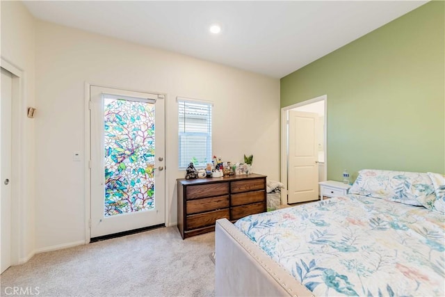 carpeted bedroom featuring access to outside