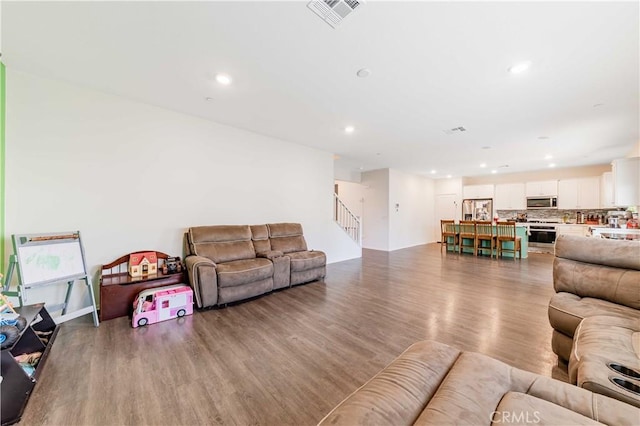 living room with hardwood / wood-style floors