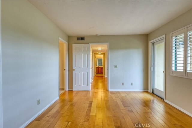 empty room featuring light hardwood / wood-style flooring