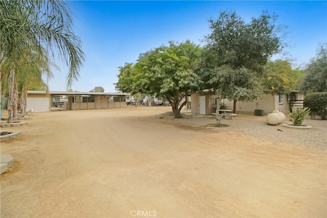 view of yard with a carport