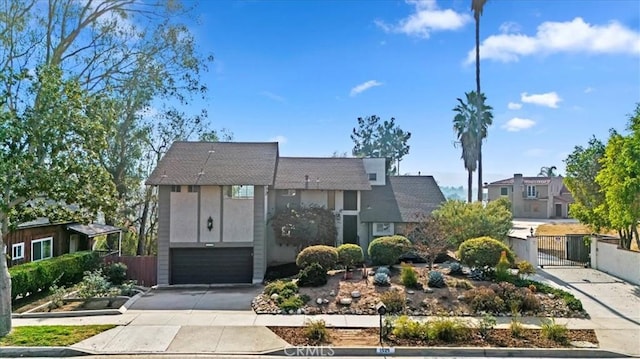 view of front of property featuring a garage