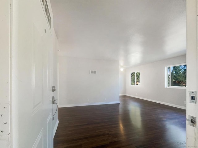 interior space featuring dark wood-type flooring