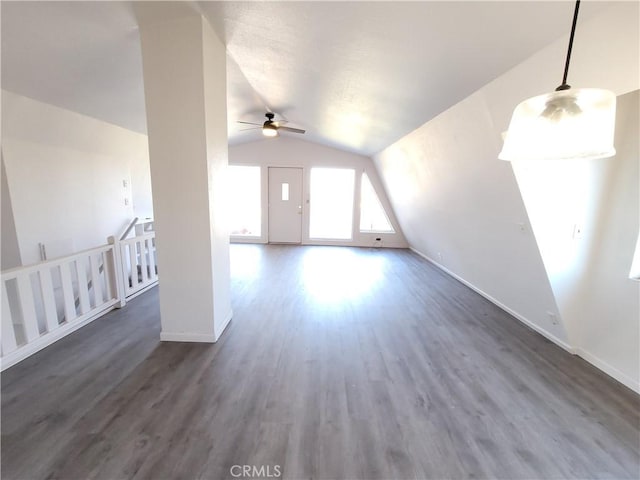 23699 Mclane Ave, Corning, CA 96021 - additional living space featuring vaulted ceiling, ceiling fan, wood finished floors, and baseboards