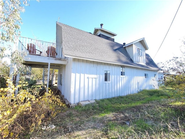 23699 Mclane Ave, Corning, CA 96021 - view of side of property featuring roof with shingles and a chimney