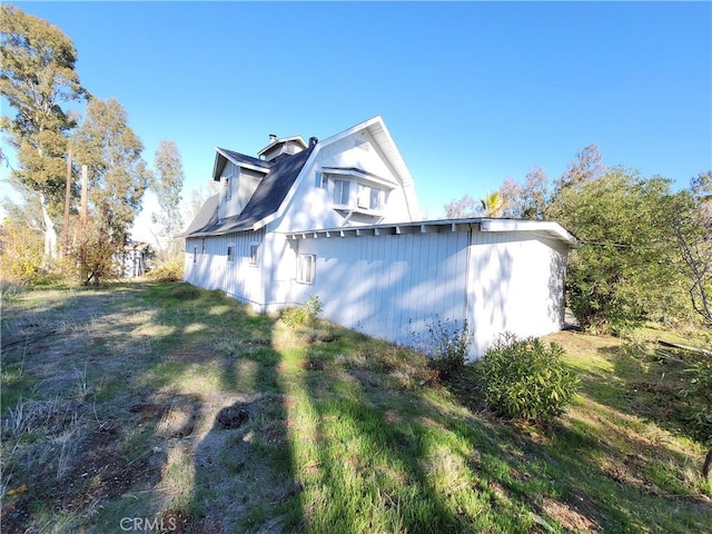 23699 Mclane Ave, Corning, CA 96021 - view of home's exterior featuring a lawn