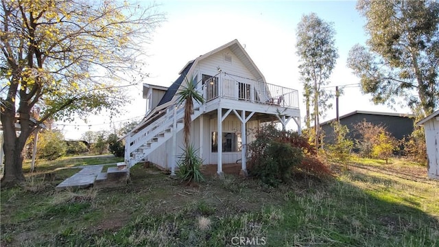 23699 Mclane Ave, Corning, CA 96021 - back of house featuring stairs and a wooden deck