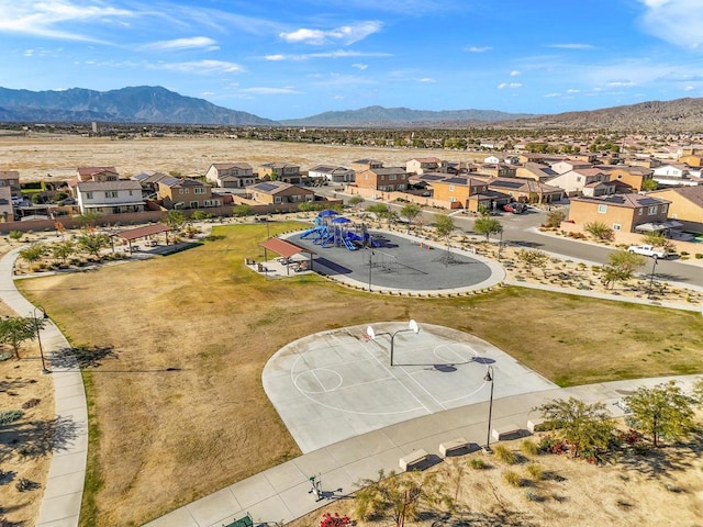 birds eye view of property featuring a mountain view