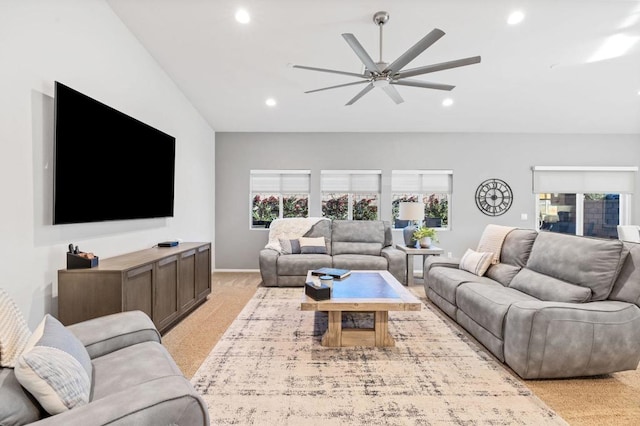 living room with ceiling fan, light carpet, and high vaulted ceiling