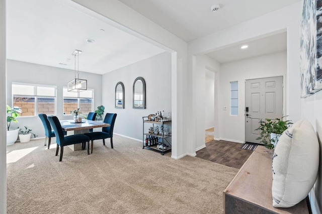 view of carpeted dining space