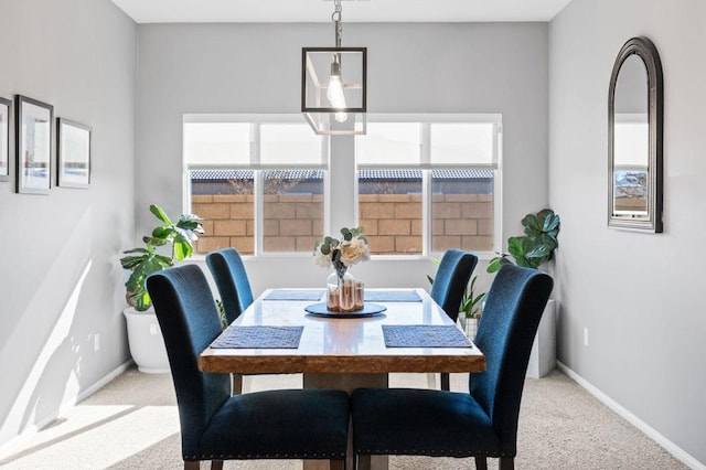 view of carpeted dining room