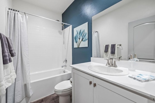 full bathroom featuring shower / bath combination with curtain, toilet, wood-type flooring, and vanity