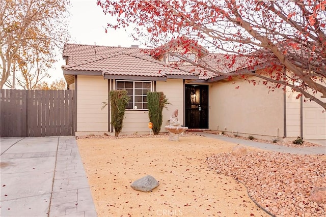 ranch-style home with a garage