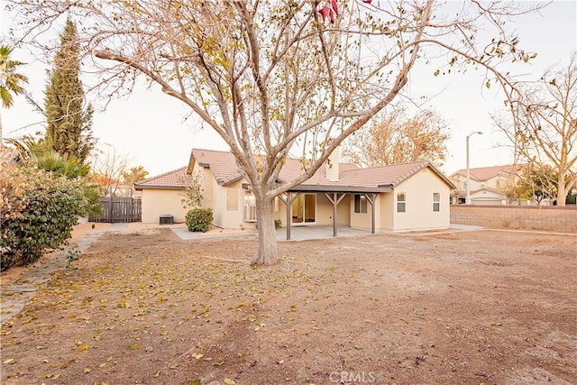 rear view of property with a patio area