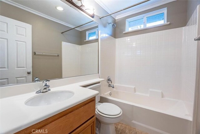 full bathroom with ornamental molding, vanity, shower / tub combination, tile patterned flooring, and toilet