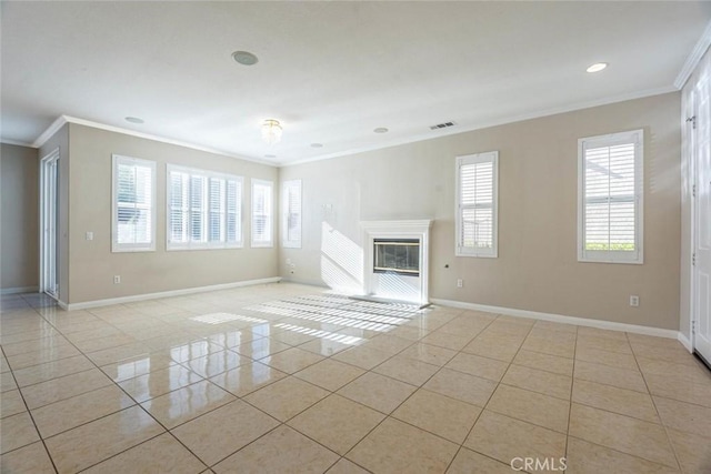 unfurnished living room with light tile patterned floors and crown molding