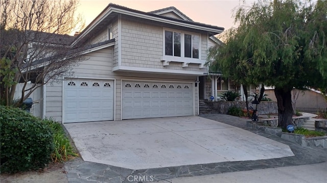 front of property featuring a garage