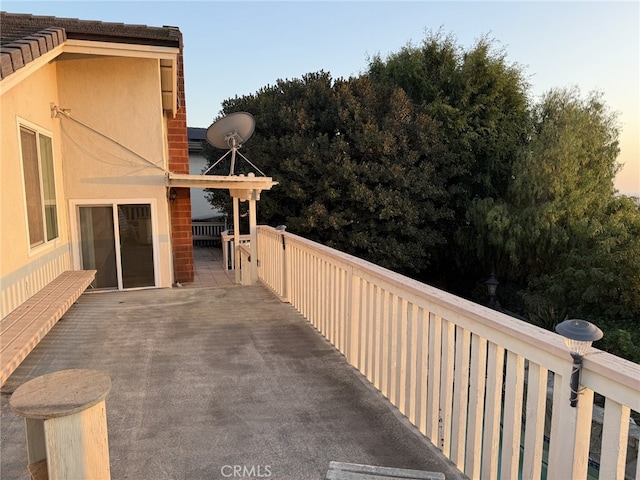 view of patio terrace at dusk