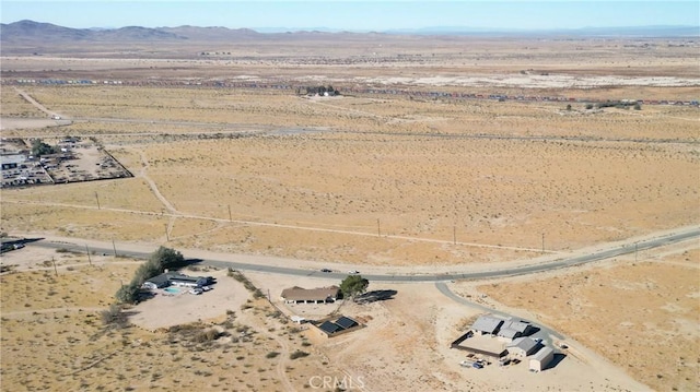 drone / aerial view with a rural view and a mountain view