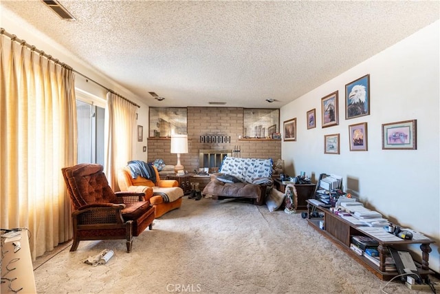 living area featuring a fireplace, a textured ceiling, and light carpet