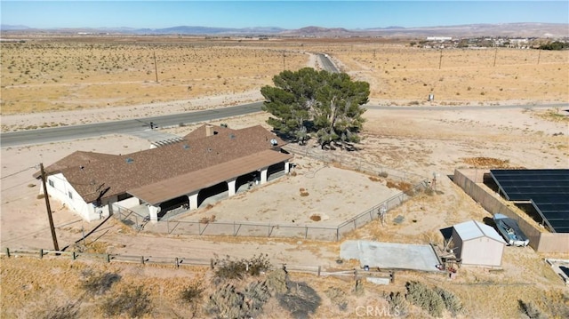 aerial view featuring a rural view and a mountain view