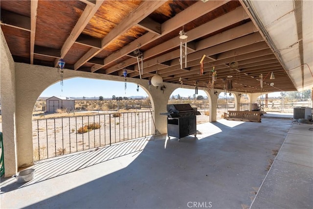 view of patio featuring grilling area and central AC unit