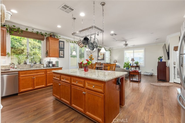 kitchen with a center island, stainless steel dishwasher, hanging light fixtures, and ceiling fan