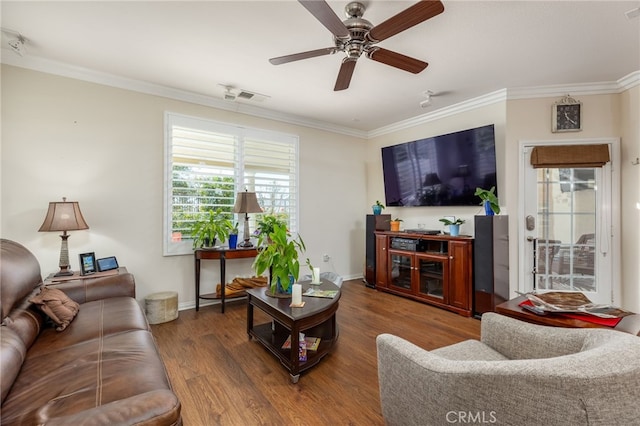 living room with ceiling fan, crown molding, and hardwood / wood-style flooring