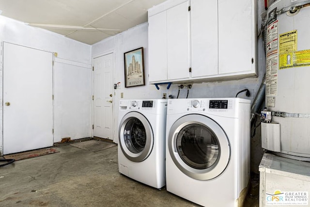 laundry area featuring cabinets and independent washer and dryer