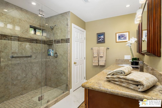 bathroom with vanity and walk in shower