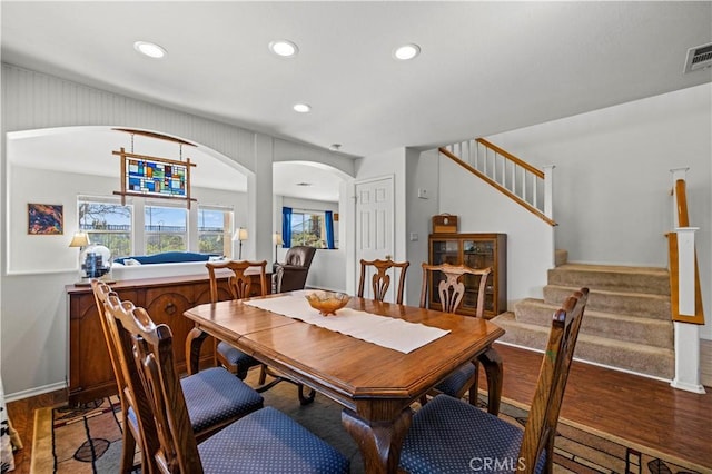 dining area featuring wood-type flooring