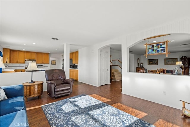 living room featuring dark hardwood / wood-style flooring