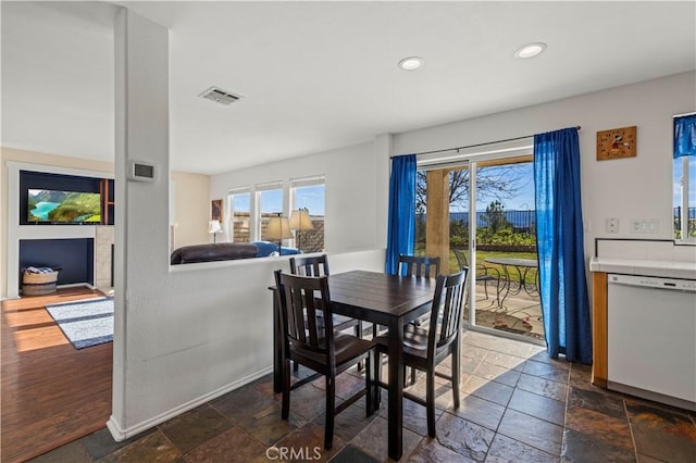 dining area with dark wood-type flooring