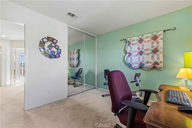 office area with light colored carpet