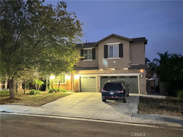 front of property featuring a garage