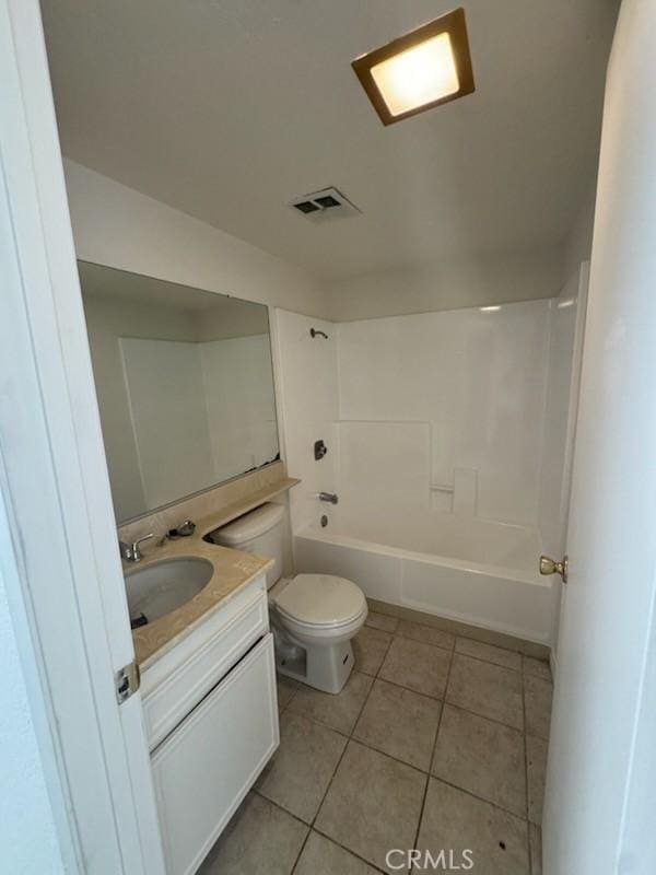 full bathroom with tile patterned floors, vanity, toilet, and shower / bathing tub combination