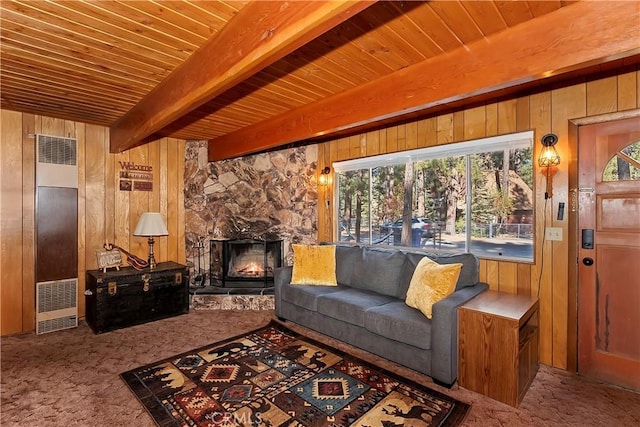 living room with wood walls, carpet, and wood ceiling