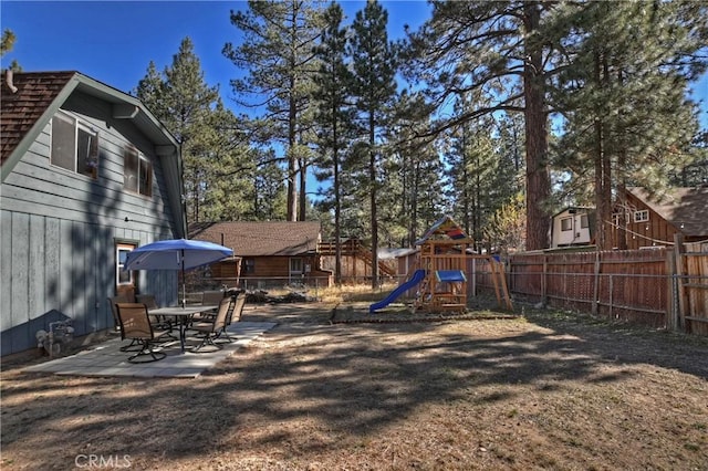 view of yard with a playground