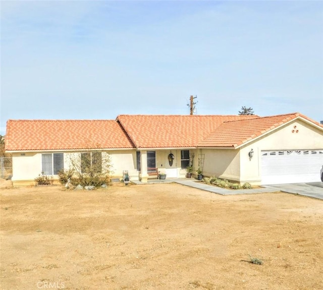 ranch-style home with a garage