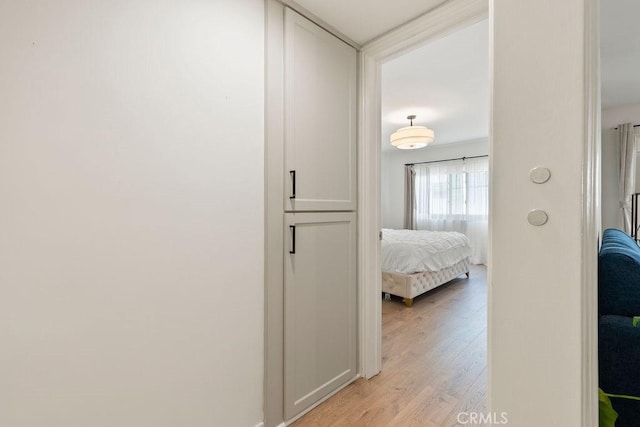 hallway featuring light wood-type flooring