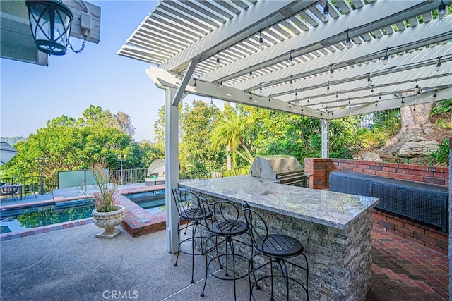 view of patio featuring area for grilling, grilling area, a fenced in pool, a pergola, and a bar