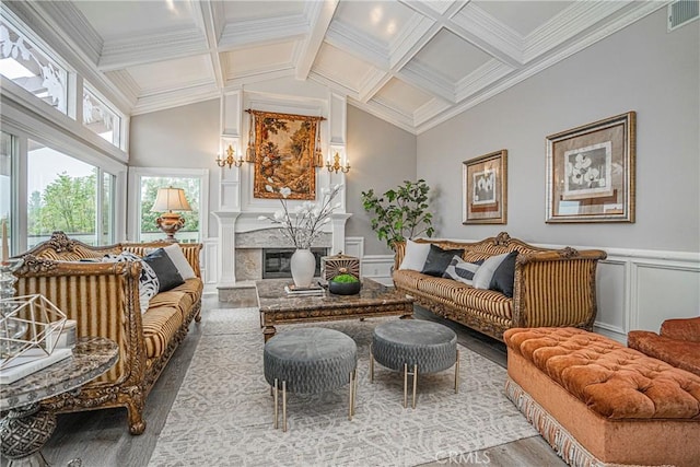 sunroom / solarium with lofted ceiling with beams, visible vents, coffered ceiling, and a high end fireplace