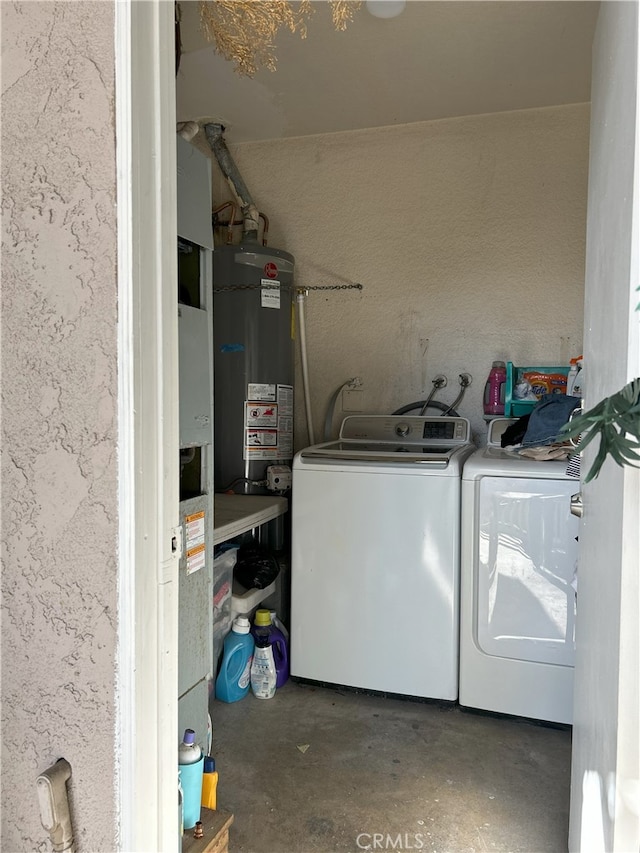 laundry room featuring washer and dryer and gas water heater