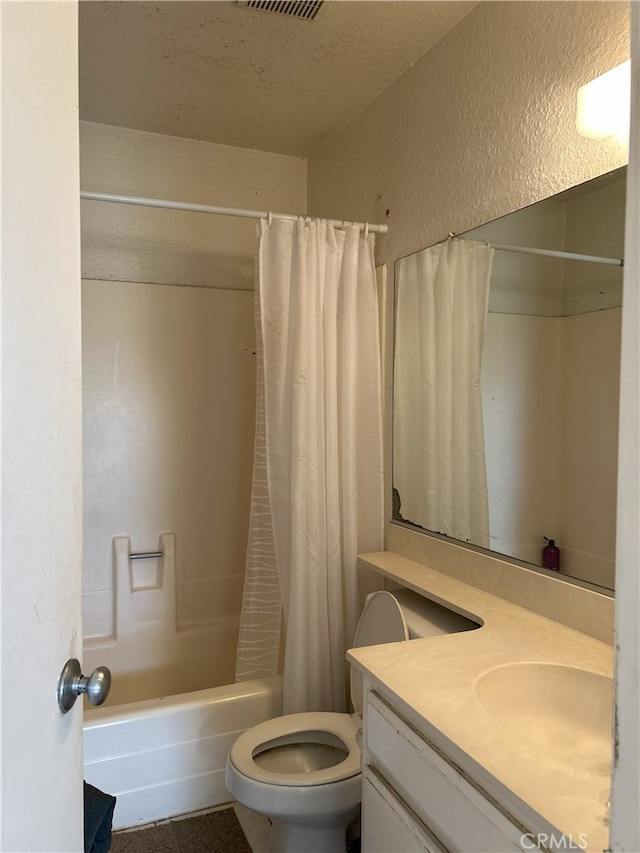 full bathroom featuring vanity, toilet, and shower / bath combo with shower curtain