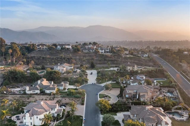 birds eye view of property with a residential view and a mountain view