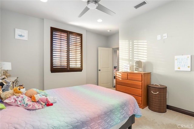 bedroom with ceiling fan and light colored carpet