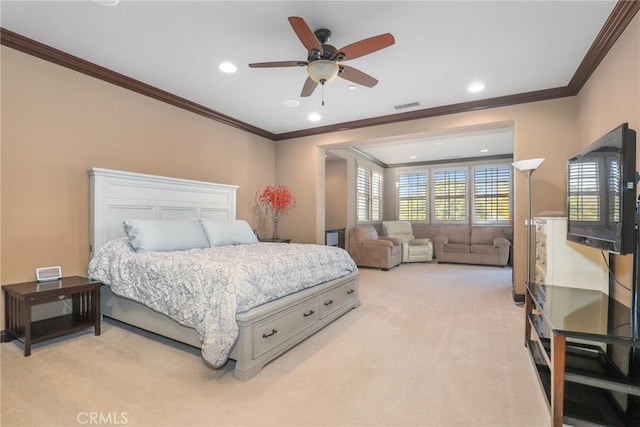 bedroom with ornamental molding, recessed lighting, light colored carpet, and visible vents