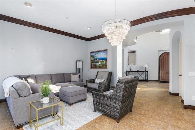 living room with a notable chandelier, baseboards, arched walkways, and crown molding