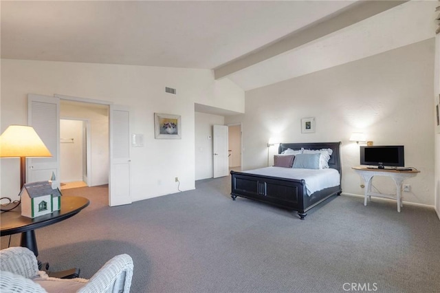 bedroom featuring vaulted ceiling with beams and carpet flooring