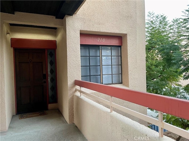 doorway to property with a balcony