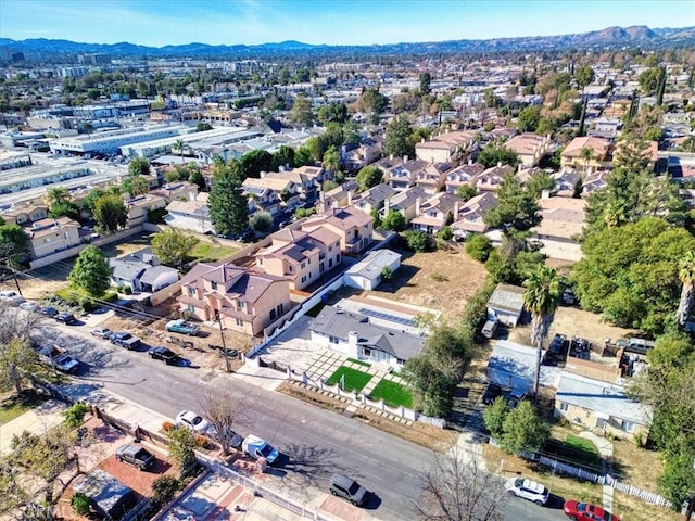 birds eye view of property featuring a mountain view